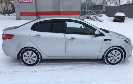 KIA Rio III рестайлинг, 2012 год, 700 000 рублей, 40 фотография