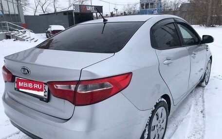 KIA Rio III рестайлинг, 2012 год, 700 000 рублей, 39 фотография
