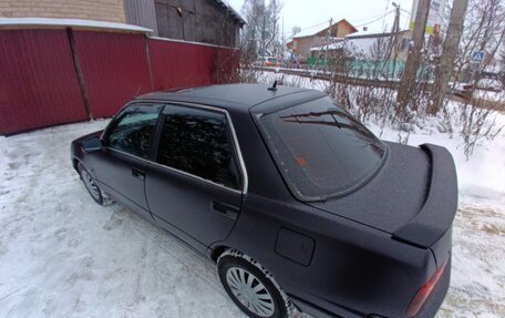 Daihatsu Applause I рестайлинг, 1991 год, 169 000 рублей, 10 фотография