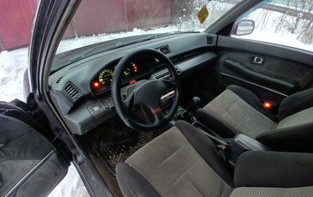 Daihatsu Applause I рестайлинг, 1991 год, 169 000 рублей, 15 фотография
