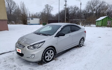 Hyundai Solaris II рестайлинг, 2011 год, 750 000 рублей, 7 фотография