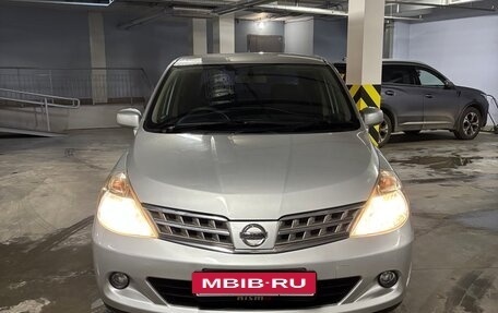 Nissan Tiida, 2010 год, 690 000 рублей, 9 фотография
