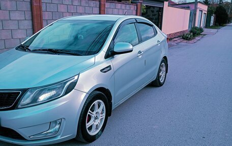 KIA Rio III рестайлинг, 2012 год, 800 000 рублей, 7 фотография