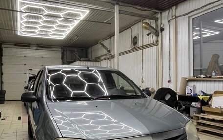 Renault Logan I, 2012 год, 499 999 рублей, 3 фотография