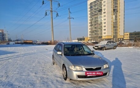 Mazda Familia, 1999 год, 320 000 рублей, 6 фотография