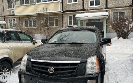 Cadillac SRX II рестайлинг, 2007 год, 600 000 рублей, 1 фотография