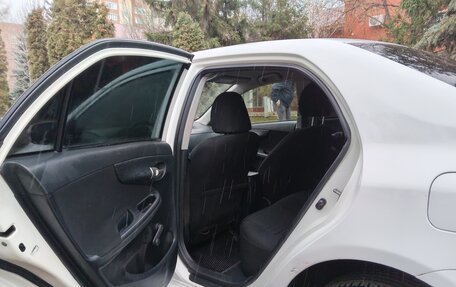 Toyota Corolla, 2011 год, 650 000 рублей, 8 фотография