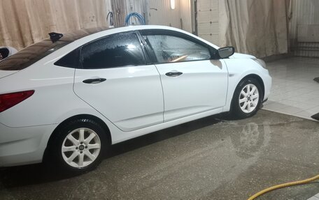 Hyundai Solaris II рестайлинг, 2013 год, 700 000 рублей, 31 фотография