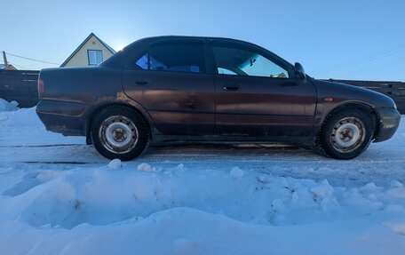 Mitsubishi Carisma I, 1997 год, 123 000 рублей, 5 фотография