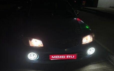 Mazda Familia, 1998 год, 230 000 рублей, 4 фотография