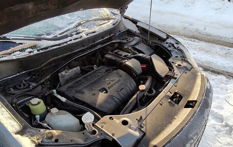 Mitsubishi Outlander III рестайлинг 3, 2011 год, 1 400 000 рублей, 11 фотография