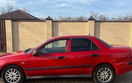 Mitsubishi Carisma I, 2003 год, 300 000 рублей, 18 фотография