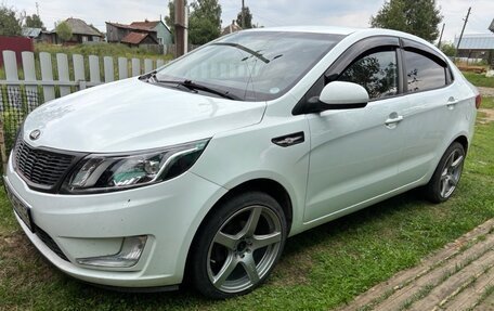 KIA Rio III рестайлинг, 2012 год, 680 000 рублей, 3 фотография