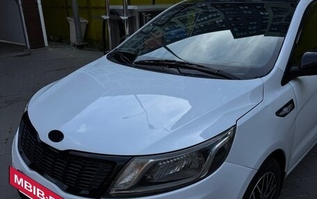 KIA Rio III рестайлинг, 2013 год, 700 000 рублей, 13 фотография