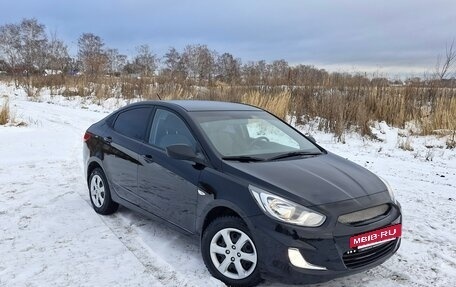 Hyundai Solaris II рестайлинг, 2011 год, 639 000 рублей, 8 фотография