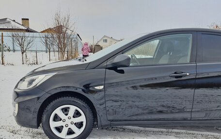 Hyundai Solaris II рестайлинг, 2011 год, 639 000 рублей, 21 фотография