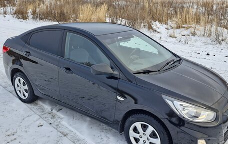 Hyundai Solaris II рестайлинг, 2011 год, 639 000 рублей, 23 фотография