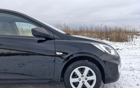 Hyundai Solaris II рестайлинг, 2011 год, 639 000 рублей, 22 фотография