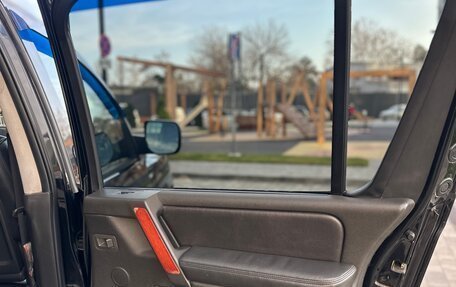 Infiniti QX56, 2005 год, 1 000 000 рублей, 26 фотография