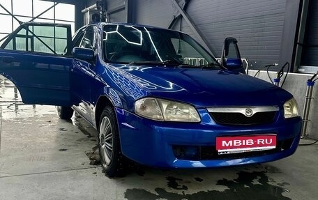 Mazda Familia Y11, 2000 год, 385 000 рублей, 1 фотография
