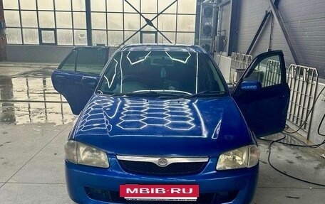Mazda Familia Y11, 2000 год, 385 000 рублей, 3 фотография