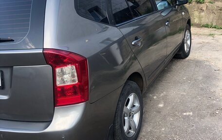 KIA Carens III (RP), 2011 год, 750 000 рублей, 4 фотография