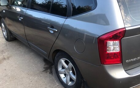 KIA Carens III (RP), 2011 год, 750 000 рублей, 2 фотография