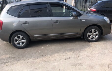 KIA Carens III (RP), 2011 год, 750 000 рублей, 5 фотография