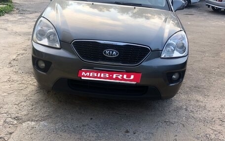 KIA Carens III (RP), 2011 год, 750 000 рублей, 7 фотография