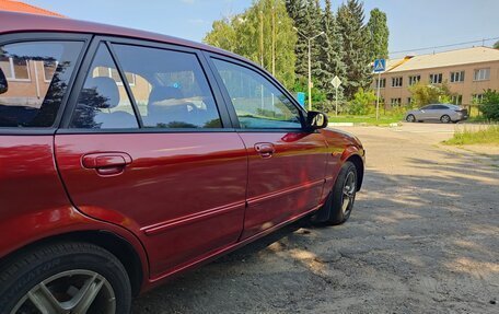 Mazda 323, 2002 год, 245 000 рублей, 16 фотография