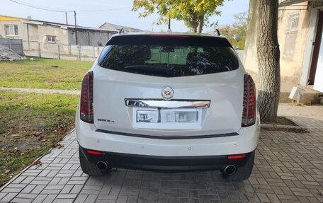 Cadillac SRX II рестайлинг, 2011 год, 920 000 рублей, 6 фотография