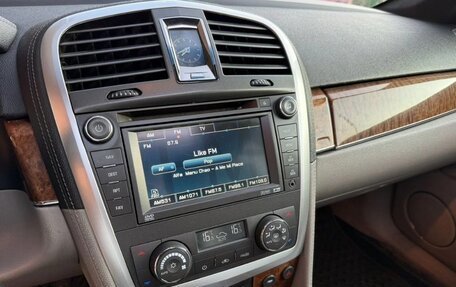 Cadillac SRX II рестайлинг, 2009 год, 650 000 рублей, 28 фотография