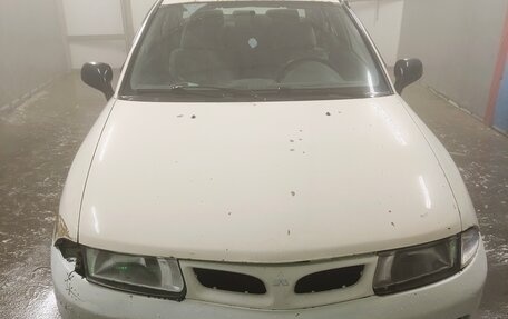 Mitsubishi Carisma I, 1998 год, 110 000 рублей, 9 фотография