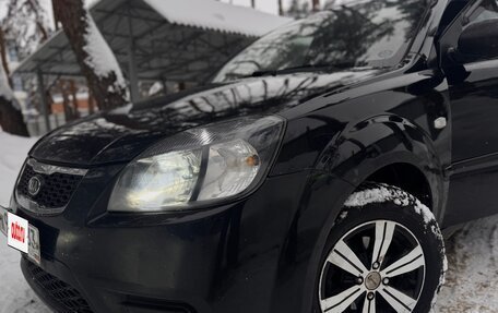 KIA Rio II, 2011 год, 750 000 рублей, 11 фотография