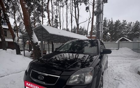 KIA Rio II, 2011 год, 750 000 рублей, 7 фотография