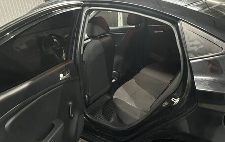 Hyundai Solaris II рестайлинг, 2011 год, 670 000 рублей, 11 фотография