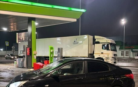 Hyundai Solaris II рестайлинг, 2011 год, 670 000 рублей, 15 фотография