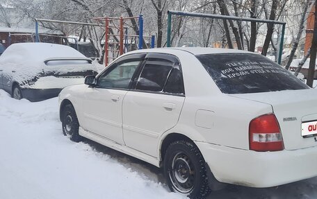 Mazda Familia, 1999 год, 330 000 рублей, 4 фотография