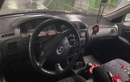 Mazda 323, 2000 год, 150 000 рублей, 9 фотография