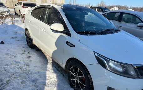 KIA Rio III рестайлинг, 2013 год, 6 фотография