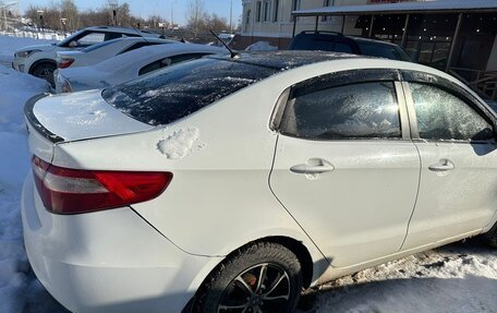 KIA Rio III рестайлинг, 2013 год, 7 фотография