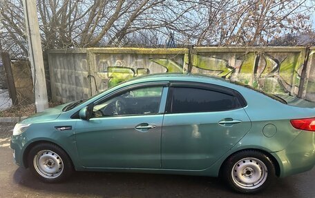 KIA Rio III рестайлинг, 2012 год, 550 000 рублей, 2 фотография