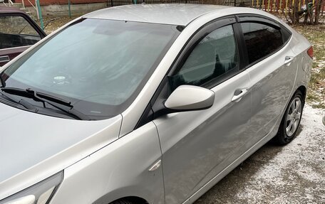 Hyundai Solaris II рестайлинг, 2012 год, 750 000 рублей, 2 фотография