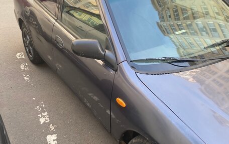 Mazda 323, 1997 год, 185 000 рублей, 2 фотография