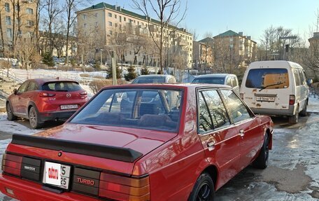 Mitsubishi Lancer VII, 1983 год, 900 000 рублей, 3 фотография