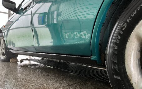 Mazda 323, 1996 год, 300 000 рублей, 15 фотография