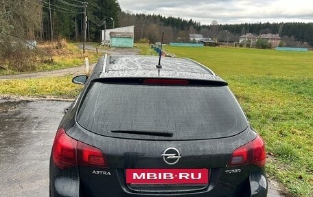 Opel Astra J, 2011 год, 900 000 рублей, 2 фотография