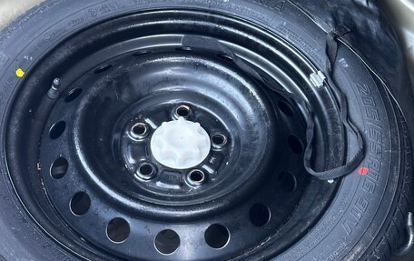 Toyota Corolla, 2012 год, 17 фотография