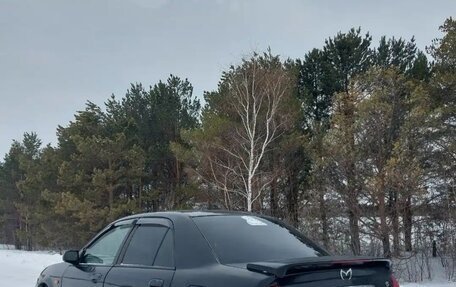 Mazda Familia, 2002 год, 220 000 рублей, 9 фотография