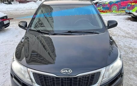 KIA Rio III рестайлинг, 2013 год, 665 000 рублей, 3 фотография